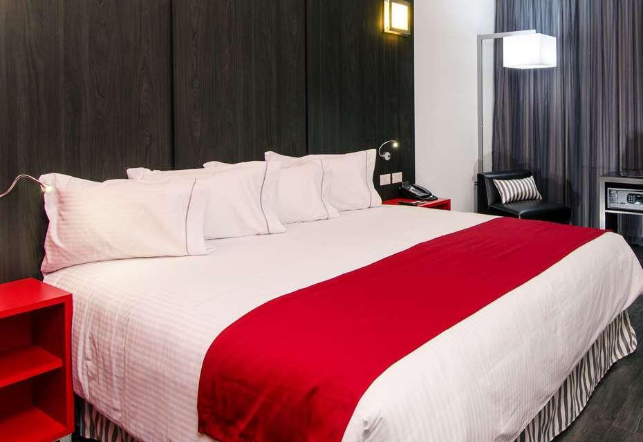 Ramada Encore By Wyndham Puebla Zimmer foto