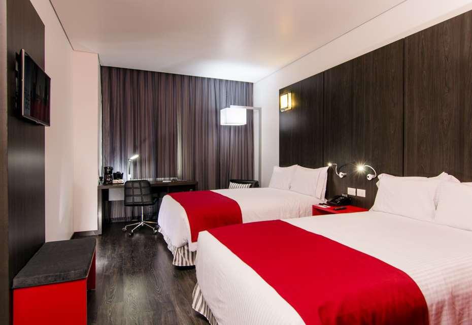 Ramada Encore By Wyndham Puebla Zimmer foto